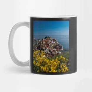 View on the cliff town of Manarola, one of the colorful Cinque Terre on the Italian west coast Mug